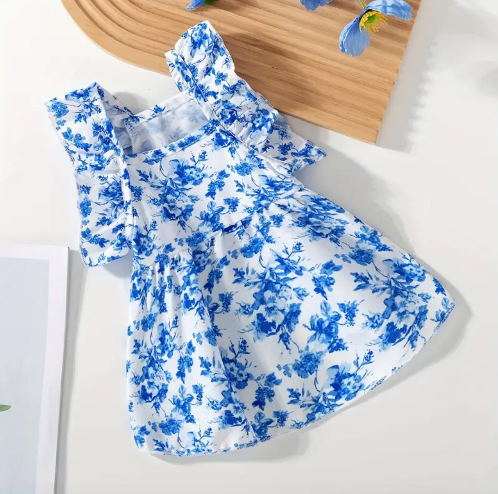 La robe pour chien bleue fleurie